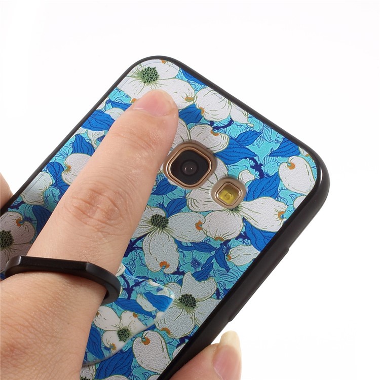 Embossed TPU Plastic Phone Case with Finger Ring Stand for Samsung Galaxy A3 (2017) - White Flowers Blue Background-12