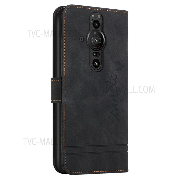003 Series Wrist Strap TPU+PU Leather Heart Imprinted Magnetic Skin-touch Stand Flip Wallet Phone Case for Sony Xperia Pro-I - Black-3