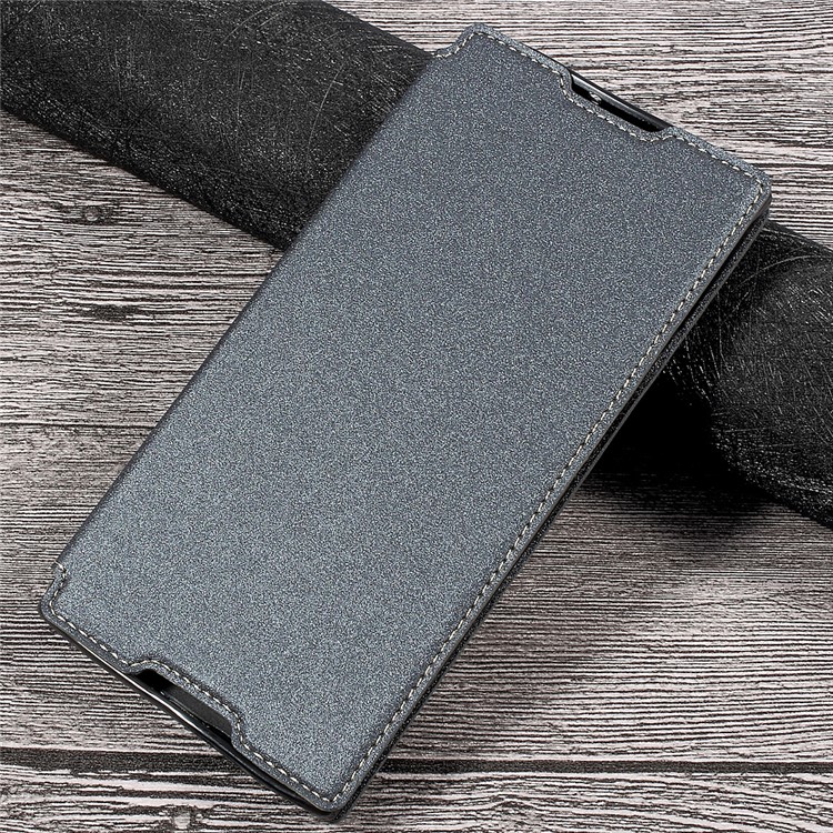 Sand-like Texture Magnetic Auto-absorbed Leather Phone Case for Sony Xperia XA1 Ultra - Grey-1