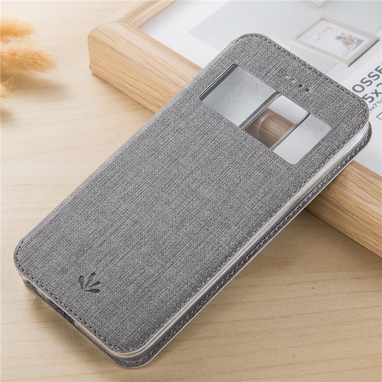 VILI DMX Cross Skin Hollow Window Stand Leather Shell for LG K10 (2017) - Grey-1