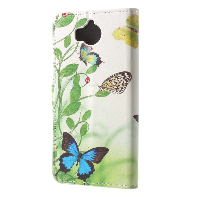 Patterned Leather Magnetic Wallet Mobile Phone Shell for Huawei Y5 (2017) / Y6 (2017) - Butterflies and Grass-2