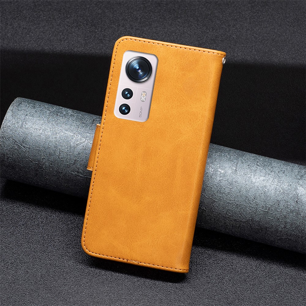 For Xiaomi 12 Textured Solid Color PU Leather Folio Flip Cover Stand Magnetic Phone Case with Strap - Yellow-8