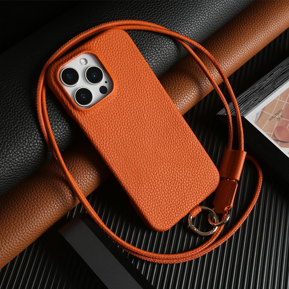 For iPhone 15 Pro Max Case With Lanyard Genuine Cow Leather PC Phone Back Cover - Orange