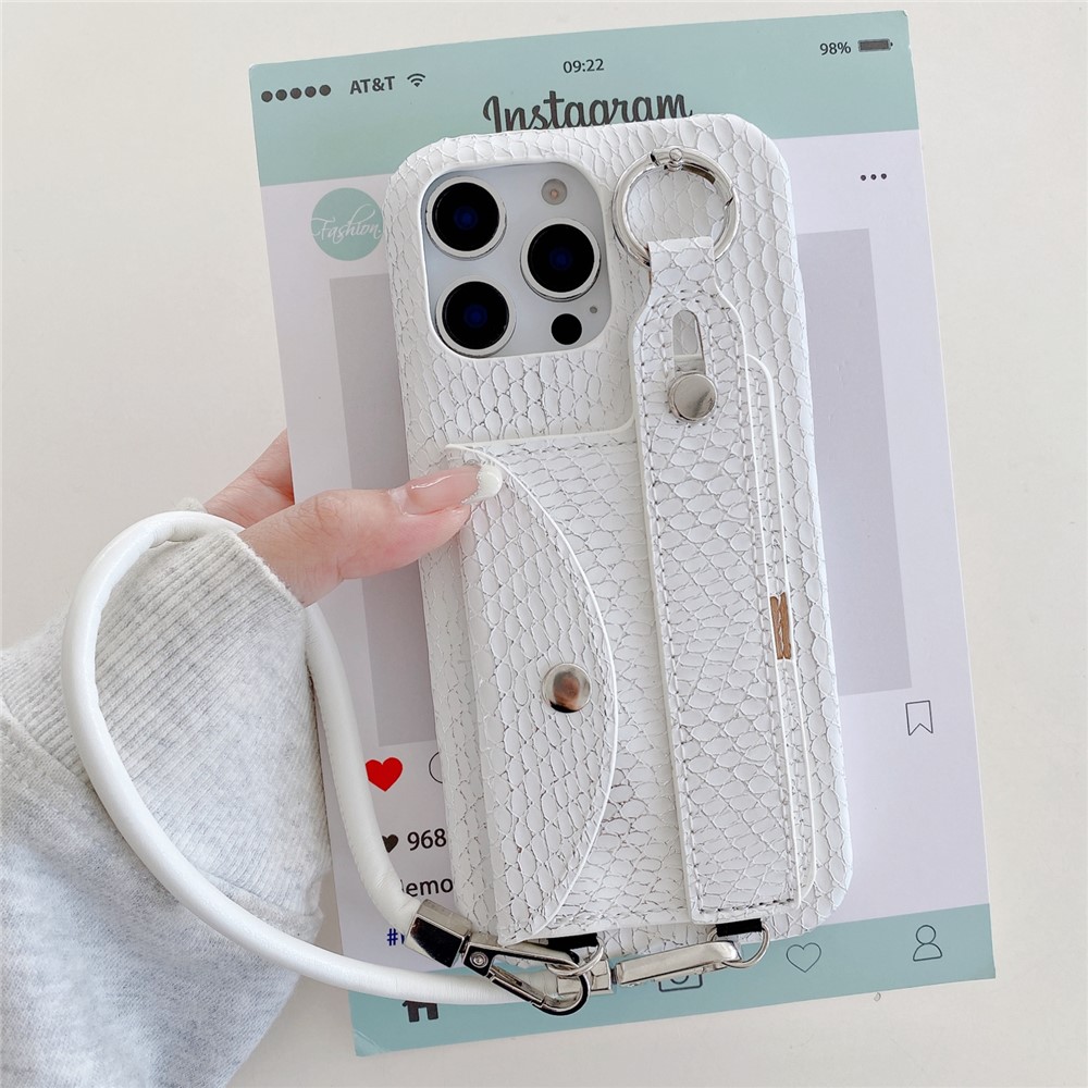 For iPhone 15 Pro Case Card Holder Wristband Lacquered Snake Texture PU + PC Back Cover with Lanyard - White
