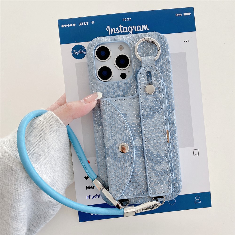 For iPhone 15 Pro Case Card Holder Wristband Lacquered Snake Texture PU + PC Back Cover with Lanyard - Blue