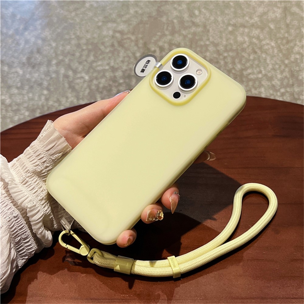 For iPhone 15 Pro Case Ice-Transparent Liquid Silicone + PC Phone Cover with Wrist Strap - Yellow