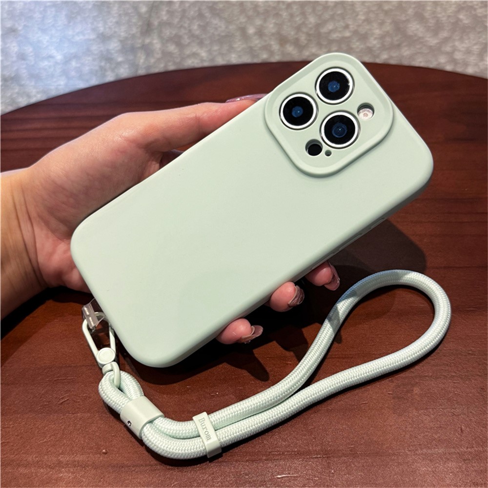 For iPhone 13 Pro Max Case Precise Cutouts Liquid Silicone + PC Phone Cover with Wrist Strap - Light Green