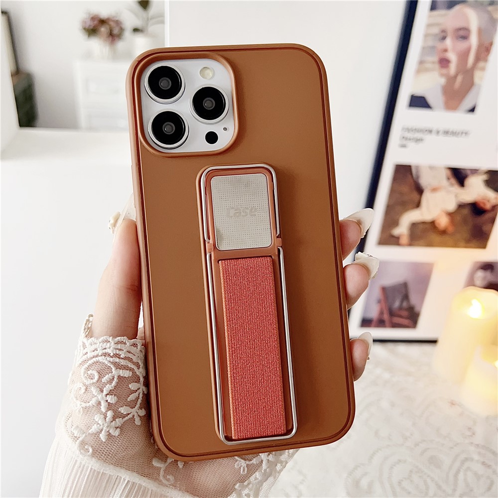 For iPhone 16 Pro Case TPU + PC Phone Cover with Kickstand / Elastic Finger Strap - Brown