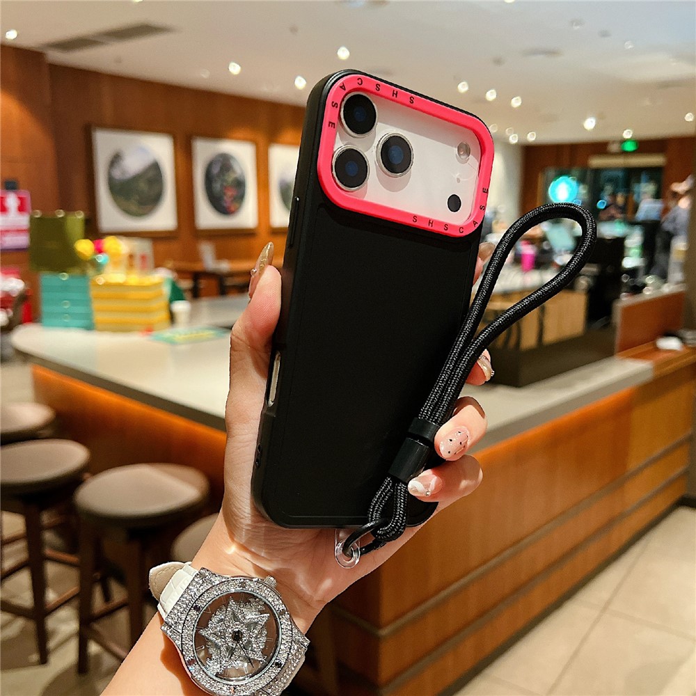 For iPhone 17 Pro Case Contrasting Colors Shockproof TPU Phone Cover with Wrist Strap - Black