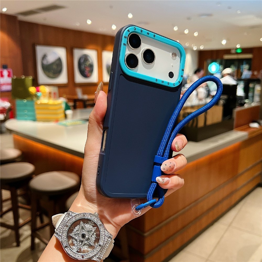 For iPhone 17 Pro Case Contrasting Colors Shockproof TPU Phone Cover with Wrist Strap - Dark Blue
