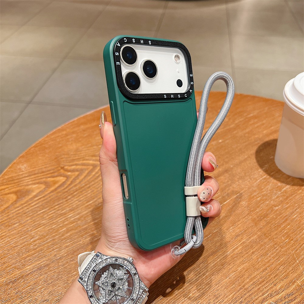 For iPhone 17 Pro Case Black Lens Frame Shockproof TPU PC Phone Back Cover with Wrist Strap - Green