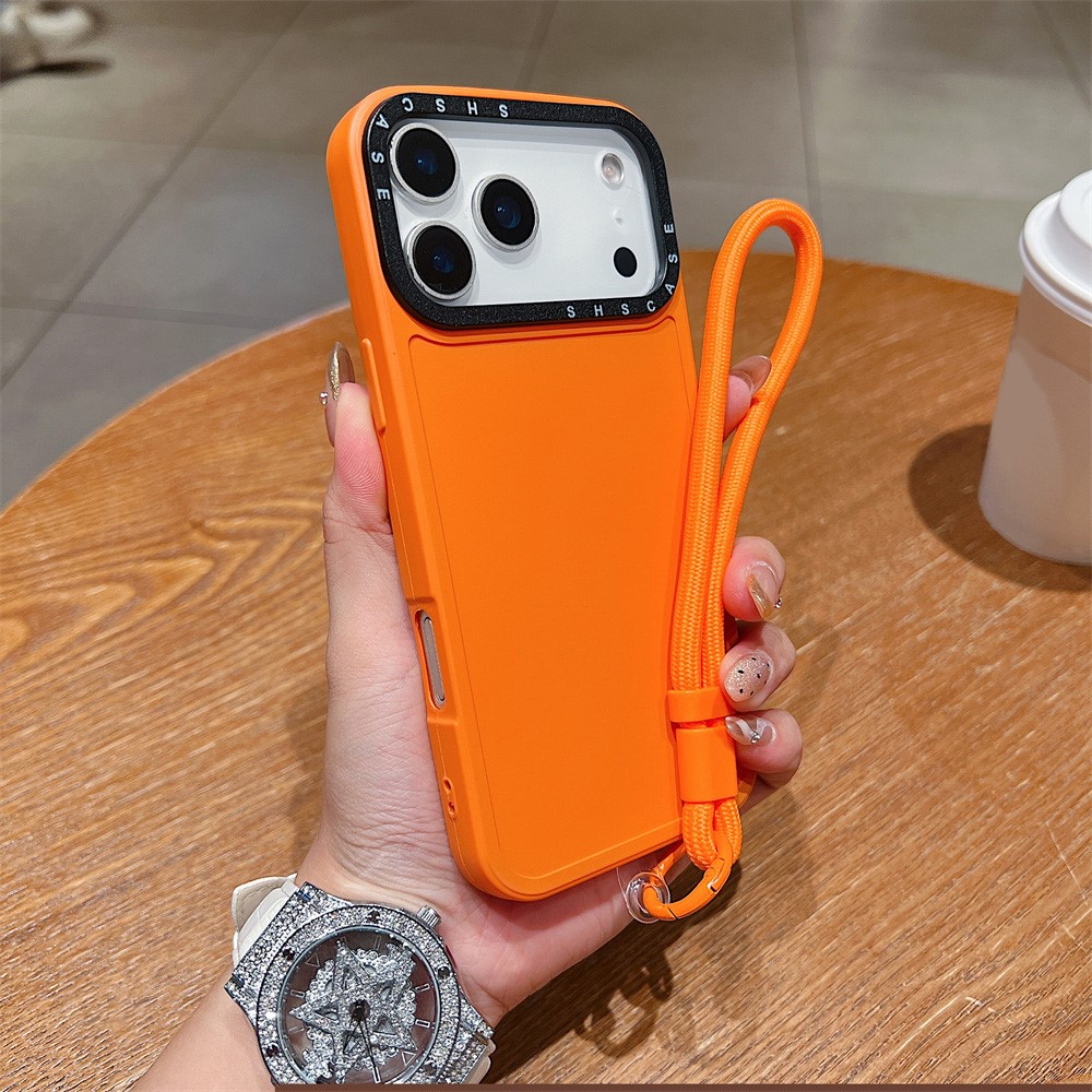 For iPhone 17 Pro Max Case Black Lens Frame Shockproof TPU PC Phone Back Cover with Wrist Strap - Orange