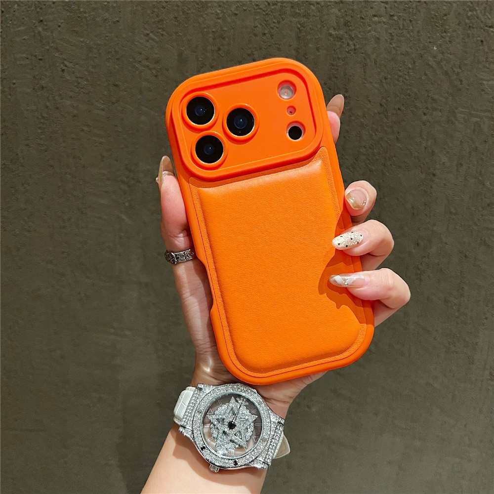 For iPhone 17 Pro Max Case Round Hole Shockproof PU + TPU Phone Back Cover - Orange