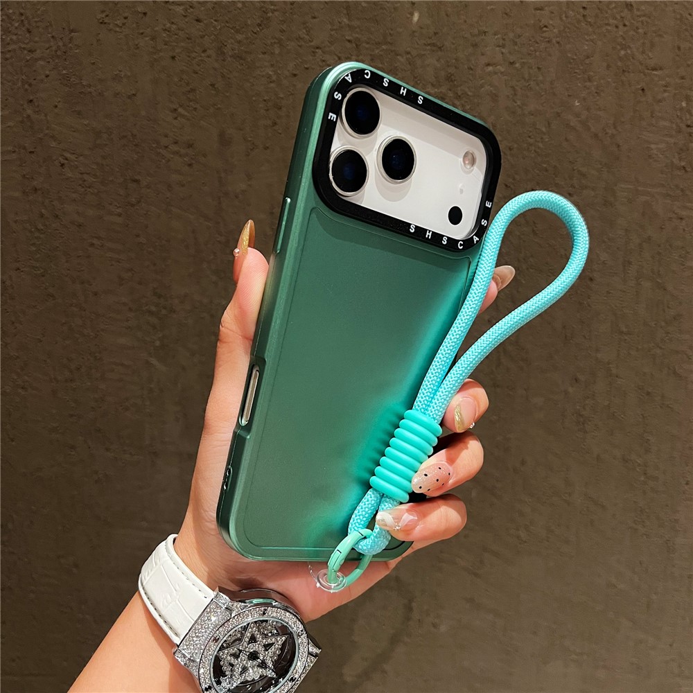 For iPhone 17 Pro Max Case Black Lens Frame Metal Paint Finish PC + TPU Phone Back Cover with Wrist Strap - Green