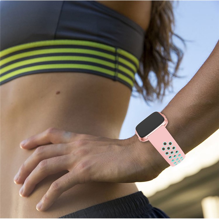 Dual-color Hollow Silicone Watch Band Strap for Fitbit Versa - Pink / Cyan-4